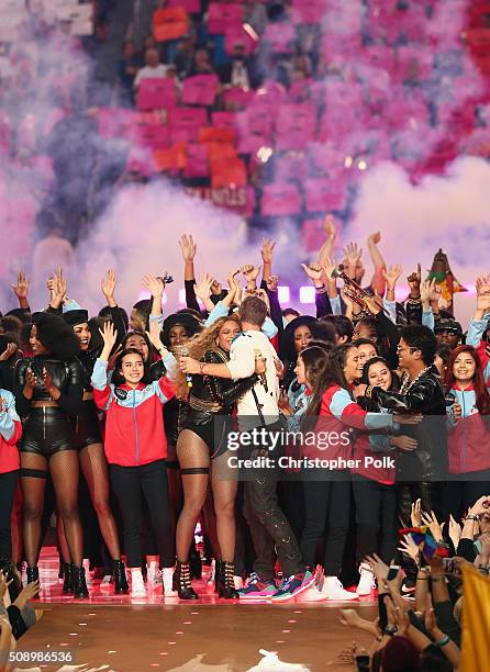Beyonce, Chris Martin of Coldplay and Bruno Mars perform onstage during the Pepsi Super Bowl 50 Halftime Show at Levi's Stadium on February 7, 2016...