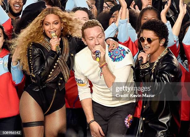 Beyonce, Chris Martin of Coldplay and Bruno Mars perform onstage during the Pepsi Super Bowl 50 Halftime Show at Levi's Stadium on February 7, 2016...