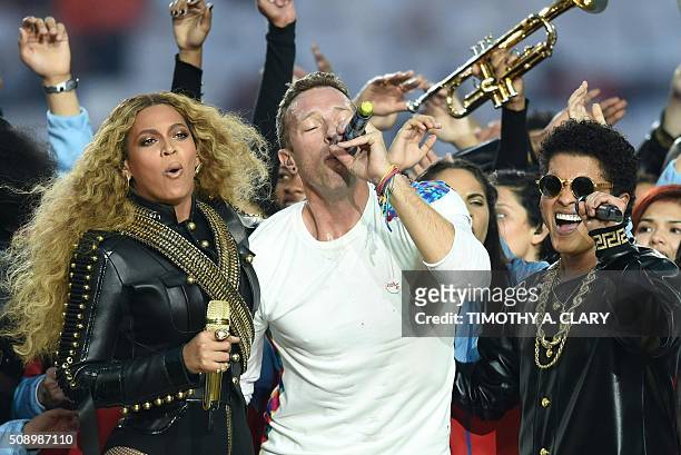 Beyonce, Chris Martin and Bruno Mars perform during Super Bowl 50 between the Carolina Panthers and the Denver Broncos at Levi's Stadium in Santa...