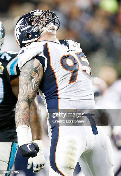 Derek Wolfe of the Denver Broncos reacts after a sack in the third quarter against the Carolina Panthers during Super Bowl 50 at Levi's Stadium on...