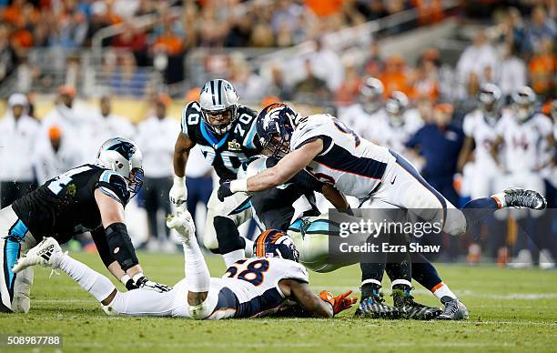 Derek Wolfe and Danny Trevathan of the Denver Broncos sack Cam Newton of the Carolina Panthers in the third quarter during Super Bowl 50 at Levi's...