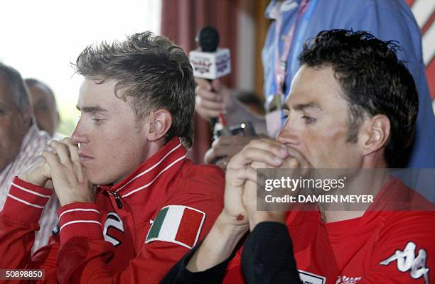 Saeco's cyclists pink jersey Damiano Cunego and teammate Gilberto Simoni give a joint press conference in their hotel at Brunico 26 May 2004. Police...