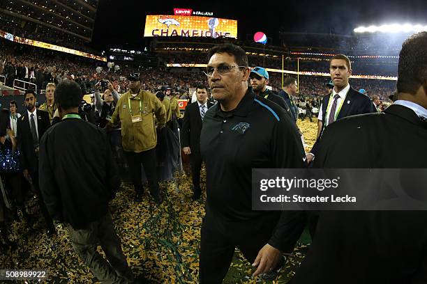 Head coach Ron Rivera of the Carolina Panthers walks off the field following their loss to the Denver Broncos in Super Bowl 50 at Levi's Stadium on...