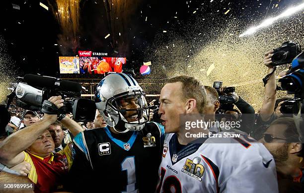 Cam Newton of the Carolina Panthers talks with Peyton Manning of the Denver Broncos after Super Bowl 50 at Levi's Stadium on February 7, 2016 in...