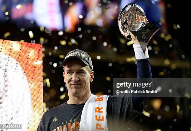 Peyton Manning of the Denver Broncos celebrates with the Vince Lombardi Trophy after Super Bowl 50 at Levi's Stadium on February 7, 2016 in Santa...