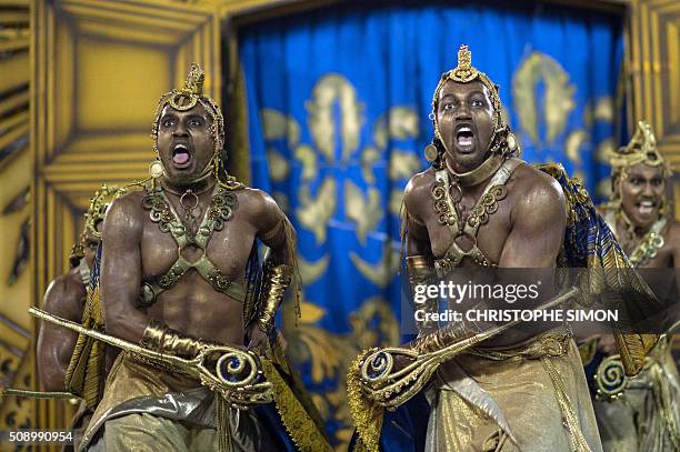 Revellers of Beija Flor samba school perform during the first night of the carnival parade at the Sambadrome in Rio de Janeiro, Brazil, on february...