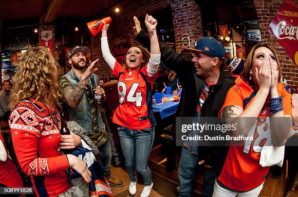 Denver Broncos fans watch Super Bowl 50 at It's Brothers, a bar in Lower Downtown on February 7, 2016 in Denver, Colorado.