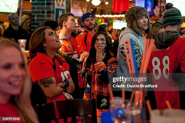 Denver Broncos fans watch Super Bowl 50 at It's Brothers, a bar in Lower Downtown on February 7, 2016 in Denver, Colorado.