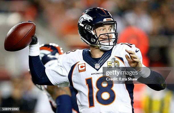 Peyton Manning of the Denver Broncos throws a pass against the Carolina Panthers during Super Bowl 50 at Levi's Stadium on February 7, 2016 in Santa...