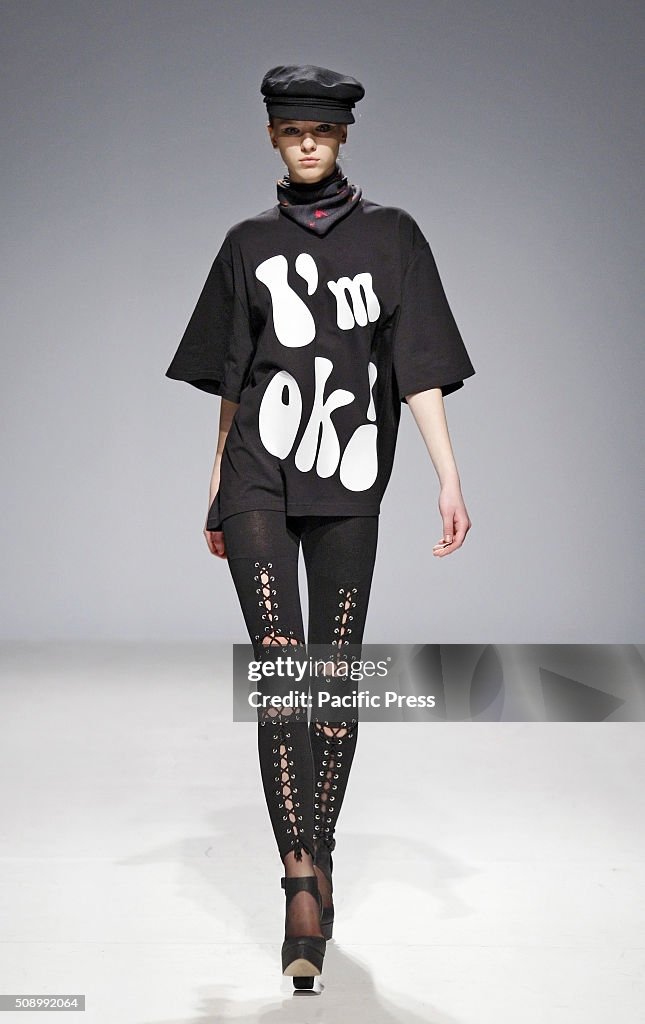 A model presents a creation by Ukrainian brand OMELYA,...