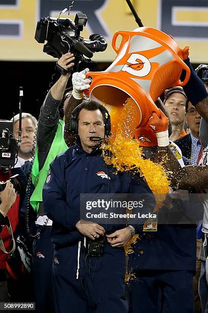 Head coach Gary Kubiak of the Denver Broncos is splashed with Gatorade in the final moments their Super Bowl 50 win at Levi's Stadium on February 7,...