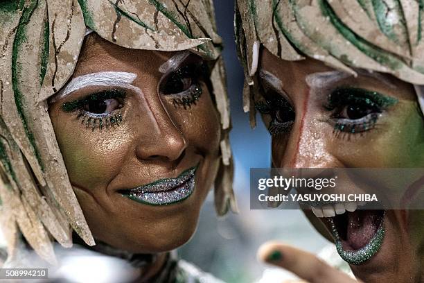 Revellers of Grande Rio samba school perform during the first night of the carnival parade at Sambadrome in Rio de Janeiro, Brazil on February 8,...