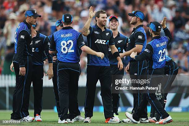 Doug Bracewell of the Black Caps celebrates the wicket of Usman Khawaja of Australia during the 3rd One Day International cricket match between the...