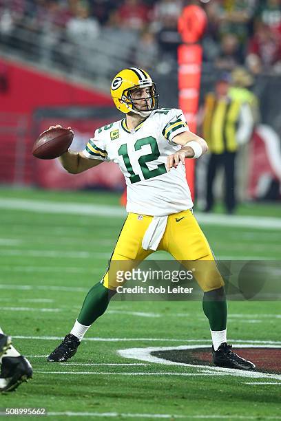 Aaron Rodgers of the Green Bay Packers in action during the game against the Arizona Cardinals at University of Phoenix Stadium on January 16, 2016...