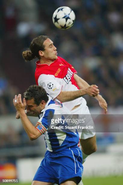 Dado Prso of AS Monaco rises above Jorge Costa of FC Porto during the UEFA Champions League Final match between AS Monaco and FC Porto at the...