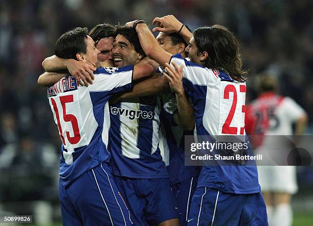 Deco of FC Porto is congratulated after he scores their second goal during the UEFA Champions League Final match between AS Monaco and FC Porto at...