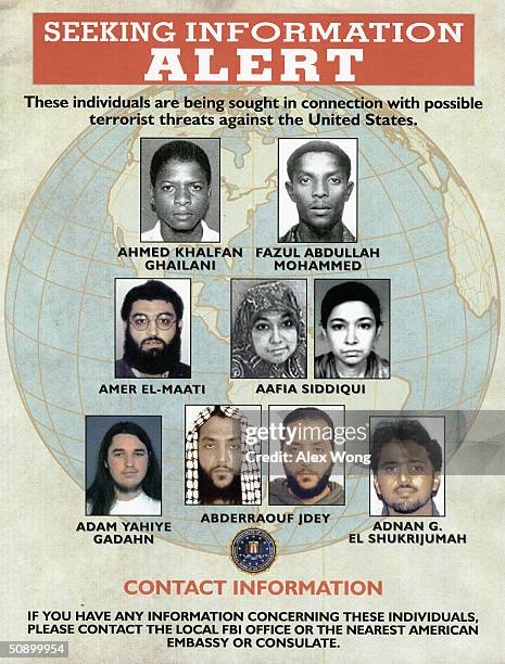 Seven individuals sought by FBI are seen on a poster displayed during a news conference at the FBI headquarters May 26, 2004 in Washington, DC. The...