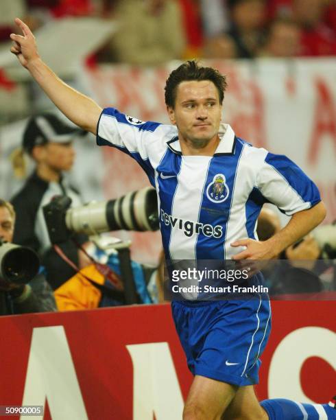 Dmitri Alenitchev of FC Porto celebrates scoring their third goal during the UEFA Champions League Final match between AS Monaco and FC Porto at the...