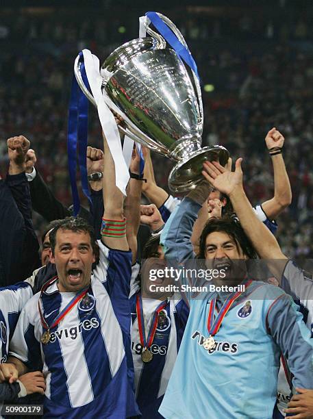 Captain Jorge Costa and goalkeeper Vitor Baia of FC Porto lift the Champions League trophy during the UEFA Champions League Final match between AS...