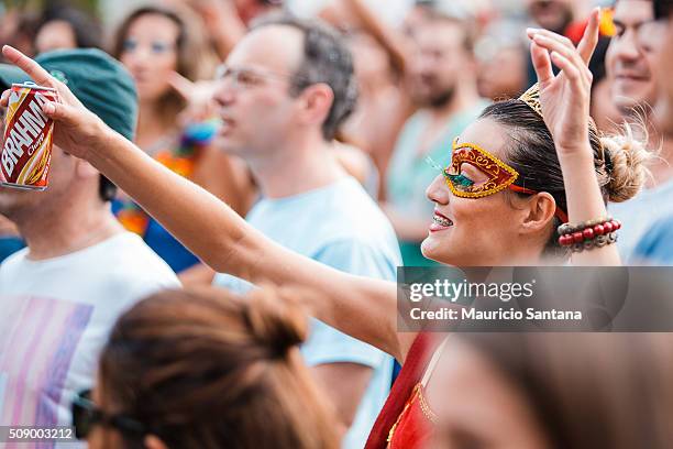 Revellers have fun during the street carnival on February 7, 2016 in Sao Paulo, Brazil. Many groups, called blocos, have a band, and thousands of...