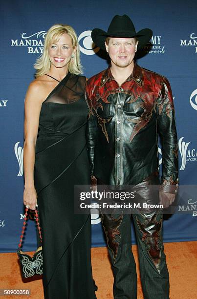 Musician Tracy Lawrence and his Wife Becca Lawrence attend the "39th Annual Country Music Awards" at the Mandalay Bay Hotel & Casino on May 26, 2004...