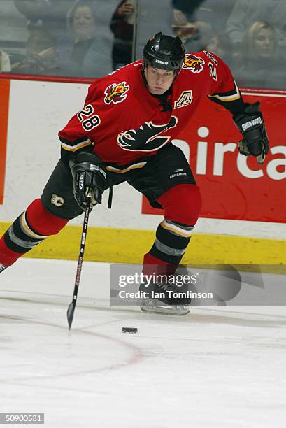 Robyn Regehr of the Calgary Flames skates during the game against the Edmonton Oilers at The Pengrowth Saddledome on December 23, 2003 in Calgary,...