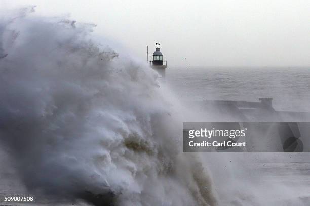 Waves hit a harbour wall on February 8, 2016 in Newhaven, East Sussex. Storm Imogen is the ninth named storm to hit the UK this season. This year's...