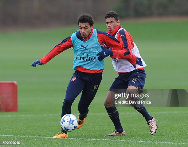 Donyell Malen and Marcus McGuane of Arsenal the U19 team during their training session at London Colney on February 8, 2016 in St Albans, England.