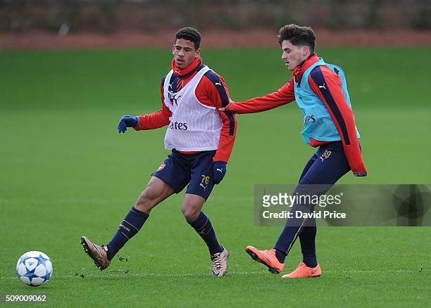 Marcus McGuane and Savvas Mourgos of Arsenal the U19 team during their training session at London Colney on February 8, 2016 in St Albans, England.