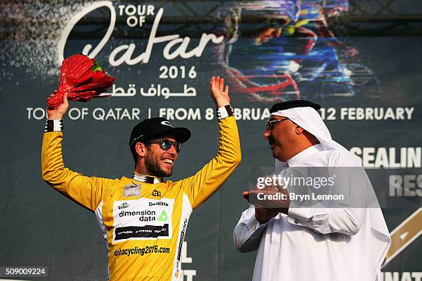 Mark Cavendish of Great Britain and Dimension Data celebrates winning stage one of the 2016 Tour of Qatar, a 176.5km road stage from Durkhan to Al...