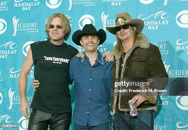 Musicians John Rich and Big Kenny of Big & Rich with Kid Rock pose backstage at the "39th Annual Country Music Awards" at the Mandalay Bay Hotel &...