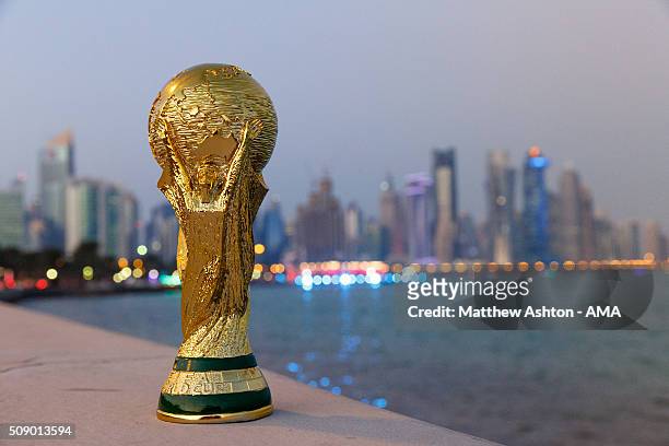 Replica of the FIFA World Cup trophy in front of the skyline along the Doha Corniche, a waterfront promenade at Doha Bay in the capital city of Doha....