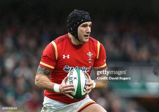 Tom James of Wales runs with the ball during the RBS Six Nations match between Ireland and Wales at the Aviva Stadium on February 7, 2016 in Dublin,...