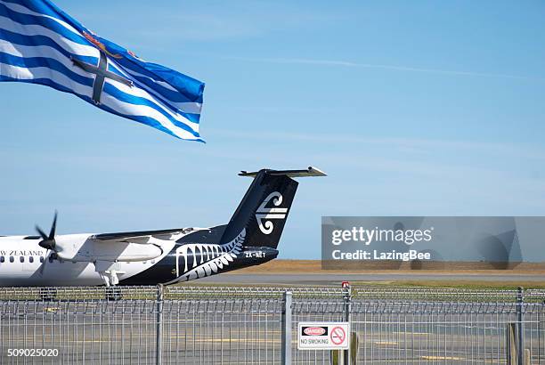 city of nelson flag and air new zealand aeroplane - flying kiwi stock pictures, royalty-free photos & images