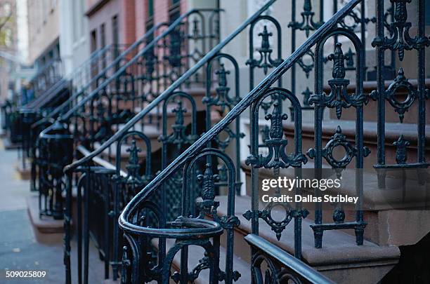 west village steps and wrought iron - hierro forjado fotografías e imágenes de stock