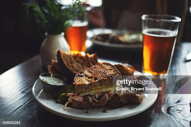 grilled sandwich - duck, egg beer - gastro pub stock pictures, royalty-free photos & images