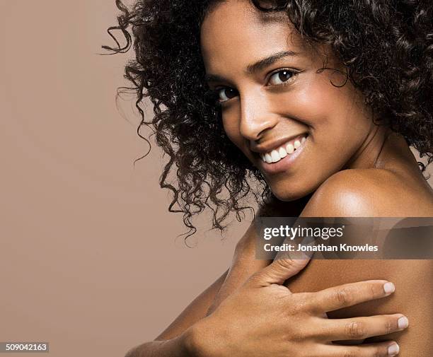 side portrait of a dark skinned female, smiling - dark skin stock pictures, royalty-free photos & images