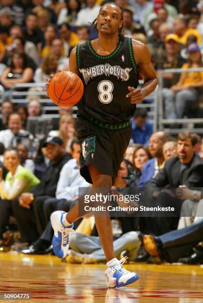 Latrell Sprewell of the Minnesota Timberwolves handles the ball against the Los Angeles Lakers in Game four of the Western Conference Finals during...