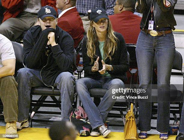 Actor Leonardo DiCaprio and girlfriend model Gisele Bundchen attend Game 4 of the NBA Western Conference Finals between the Minnesota Timberwolves...