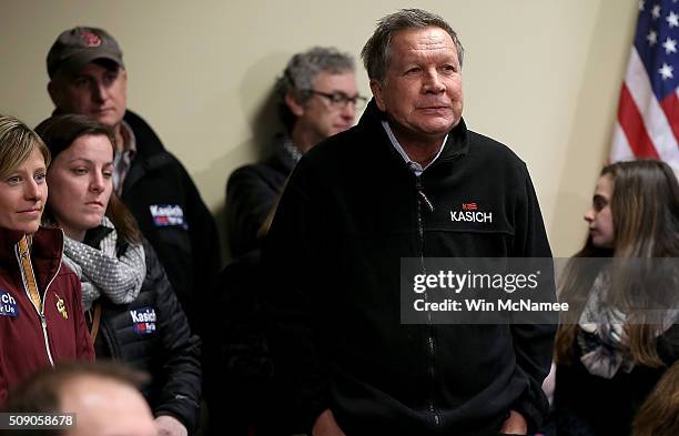 Republican presidential candidate, Ohio Gov. John Kasich waits to be introduced before a town hall at the Plaistow Town Hall February 8, 2016 in...