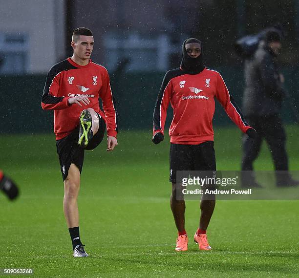 Lloyd Jones and Sheyi Ojo of Liverpool during a training session at Melwood Training Ground on February 8, 2016 in Liverpool, England.
