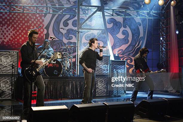 Episode 2852 -- Pictured: Musicians Jerry Horton, Jacoby Shaddix and Tobin Esperance of rock band Papa Roach perform on January 12, 2005 --