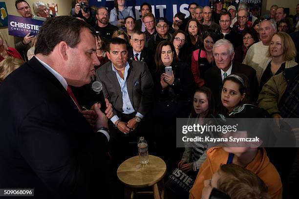 Republican Presidential candidate New Jersey Governor Chris Christie speaks with attendees at a town hall meeting with Maryland Gov. Larry Hogan at...