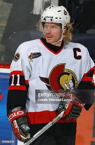 Daniel Alfredsson of the Ottawa Senators looks on against the Washington Capitals on February 17, 2004 at the MCI Center in Washington, D.C. The...