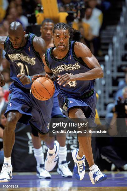 Latrell Sprewell of the Minnesota Timberwolves drives the ball up court in Game Three of the Western Conference Finals against the Los Angeles Lakers...