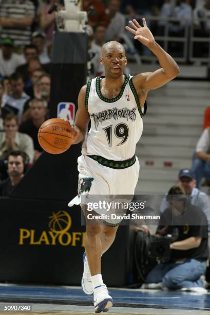 Sam Cassell of the Minnesota Timberwolves advances the ball against the Sacramento Kings in Game Seven of the Western Conference Semifinals during...