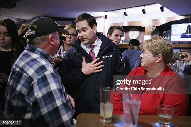 Republican presidential candidate Sen. Marco Rubio visits with customers at the Village Trestle restaurant during a campaign stop February 8, 2016 in...