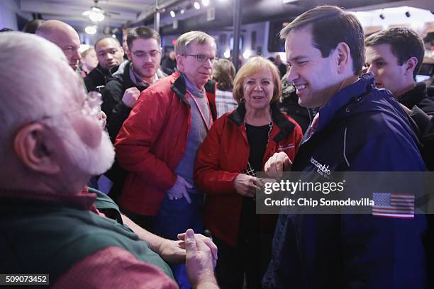 Republican presidential candidate Sen. Marco Rubio visits with customers at the Village Trestle restaurant during a campaign stop February 8, 2016 in...