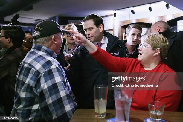 Republican presidential candidate Sen. Marco Rubio visits with customers at the Village Trestle restaurant during a campaign stop February 8, 2016 in...