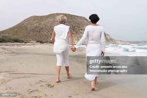 same-sex seniors - brief - buttocks gay stock pictures, royalty-free photos & images